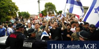 A man was arrested during a rally outside a synagogue in Caulfield North on Nov. 25, highlighting escalating tensions between pro-Israel and pro-Palestine supporters.