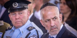 Shin Bet Director Ronen Bar (right) attends a state ceremony at the Mount Herzl Military Cemetery in Jerusalem marking the Hebrew calendar anniversary of last year's Hamas-led terrorist invasion, Oct. 27, 2024. Photo by Chaim Goldberg/Flash90.