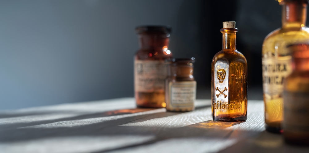 Poison bottle with skull and bones