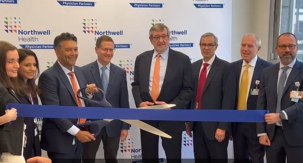 Michael Dowling (middle, with orange tie), the CEO of Northwell Health System is pictured here with Northwell officials at last week’s ribbon cutting ceremony that unveiled Concorde Cardiology at Park Avenue South in Manhattan.