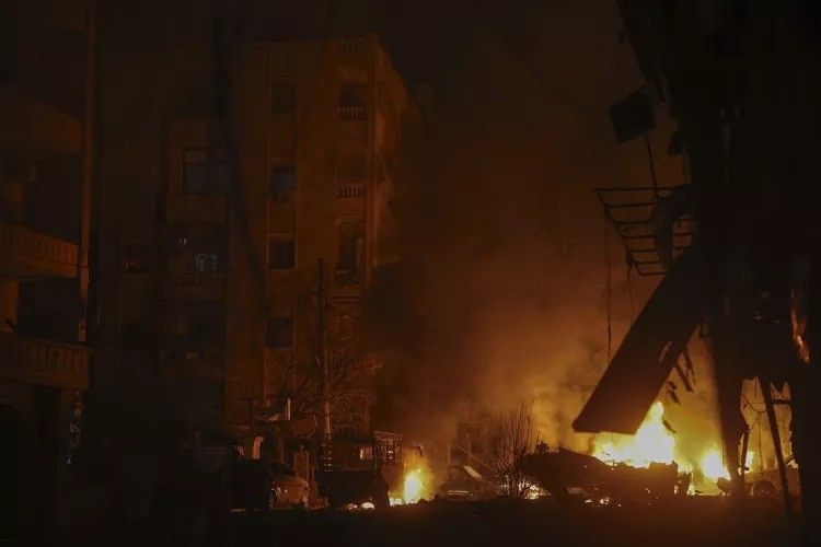 Vehicles burn after an airstrike against opposition fighters in Aleppo, Syria, late Friday, Nov. 29, 2024. (AP Photo/Ghaith Alsayed)Ghaith Alsayed/Copyright 2024 The AP. All rights reserved