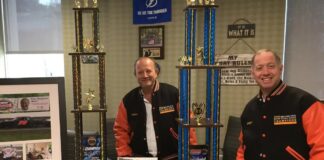 The co-owners of Centers for Care, Kenneth Rozenberg and Daryl Hagler, posing with a NASCAR Super Stock New York state championship trophy, will pay a total of $45 million after being accused of stealing nearly twice as much. Centers Health Care