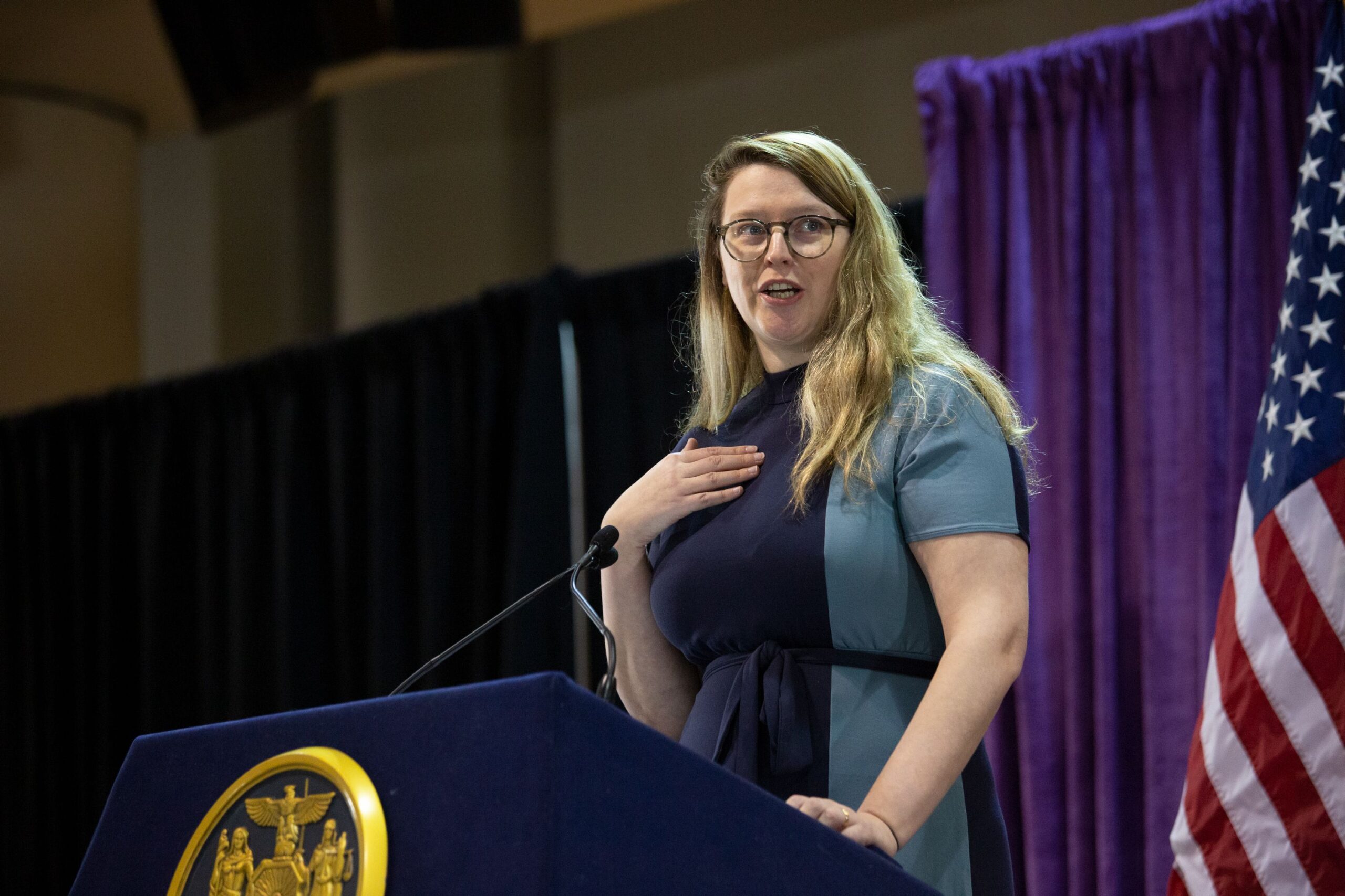 Sen. Andrew Gounardes Chief of Staff and former Vito Lopez aide Tori Burhans Kelly speaks at a Gov. Kathy Hochul anti-sexual harassment bill signing at the Jacob Javits Center, March 16, 2022.