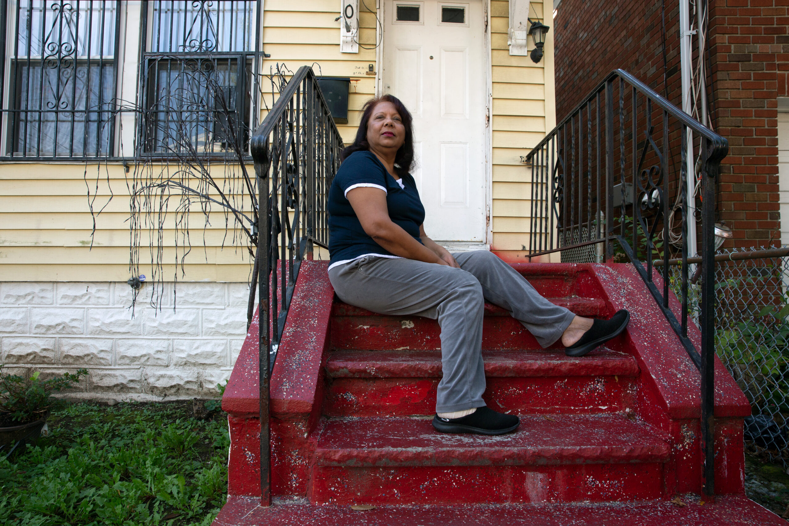 Landlord Surya Hariprasad sits outside her Bronx building, Oct. 15, 2020.