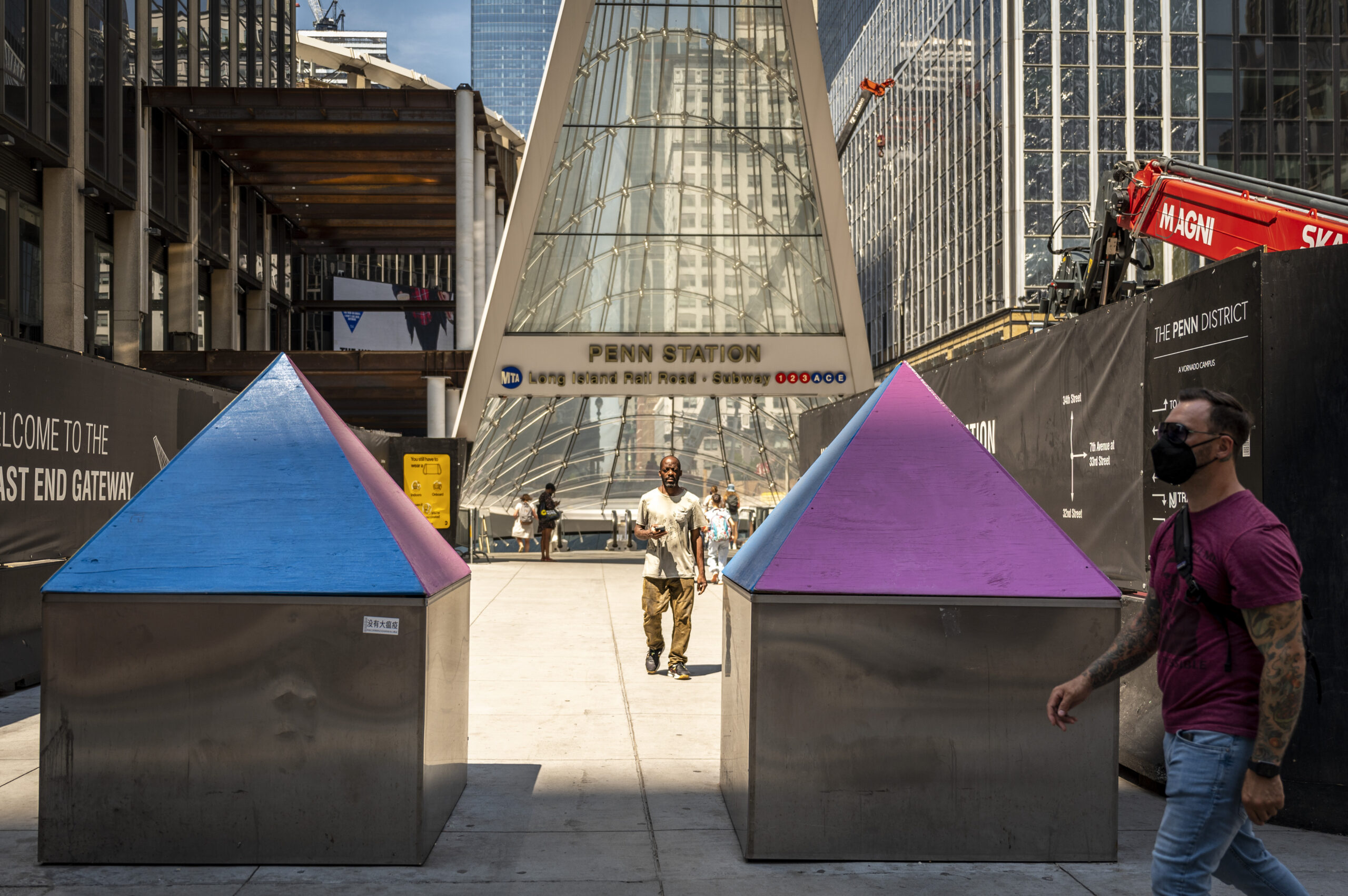 The colorful pyramids were recently added to the tops of bollards at the 33rd Street and 7th Avenue Penn Station to discourage lounging.