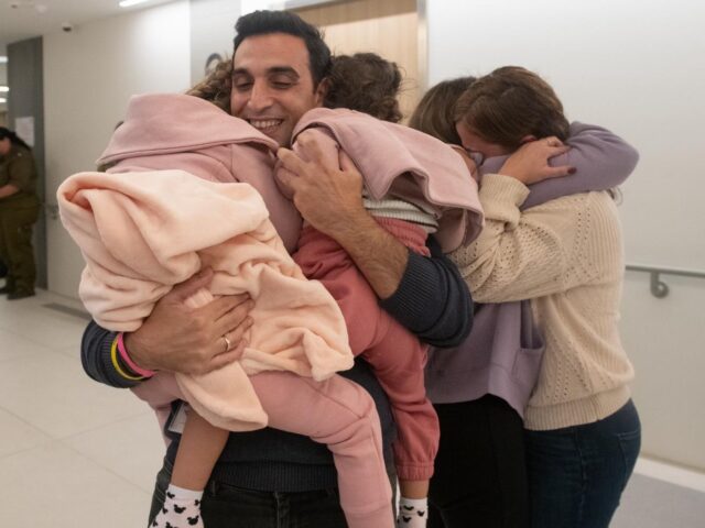 The Asher family, reunited after the mother and daughters were held hostage by Hamas for 49 days (Government Press Office)