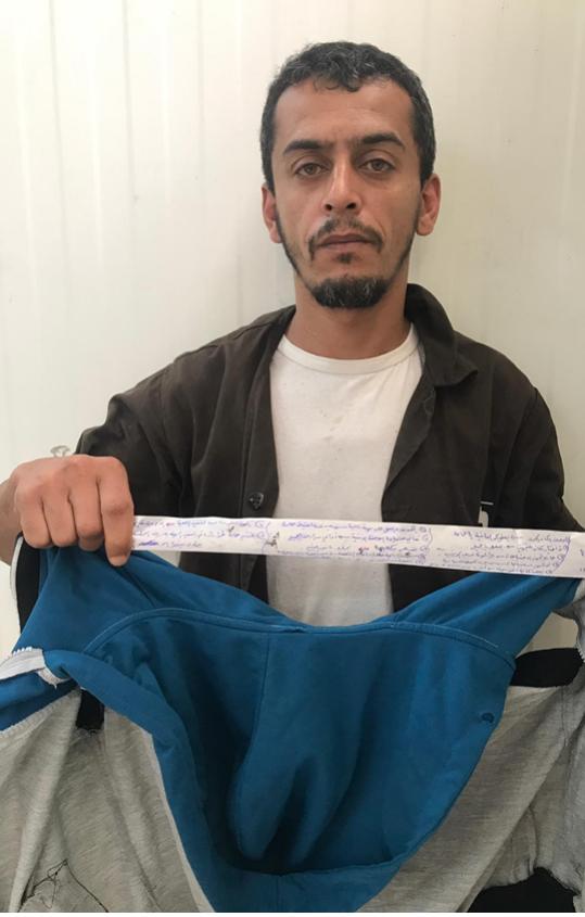 Fadi Al Sabah with hidden coded note|