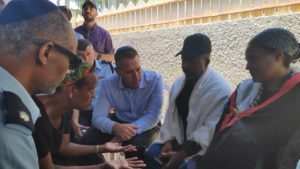 ilad Erdan with family of Solomon Takka. Photo Credit Israel Police